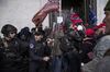 Demonstrators clash with police officers as they enter the U.S. Capitol building in Washington, D.C., on Jan. 6.