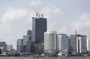 Construction cranes stand atop buildings in the Takeshiba area of Tokyo, Japan, on Monday, May 13, 2019. Japan’s economy surprised with solid growth during the first quarter of the year, but that is likely to give little comfort to policy makers worried about economic momentum ahead of a looming sales tax increase.