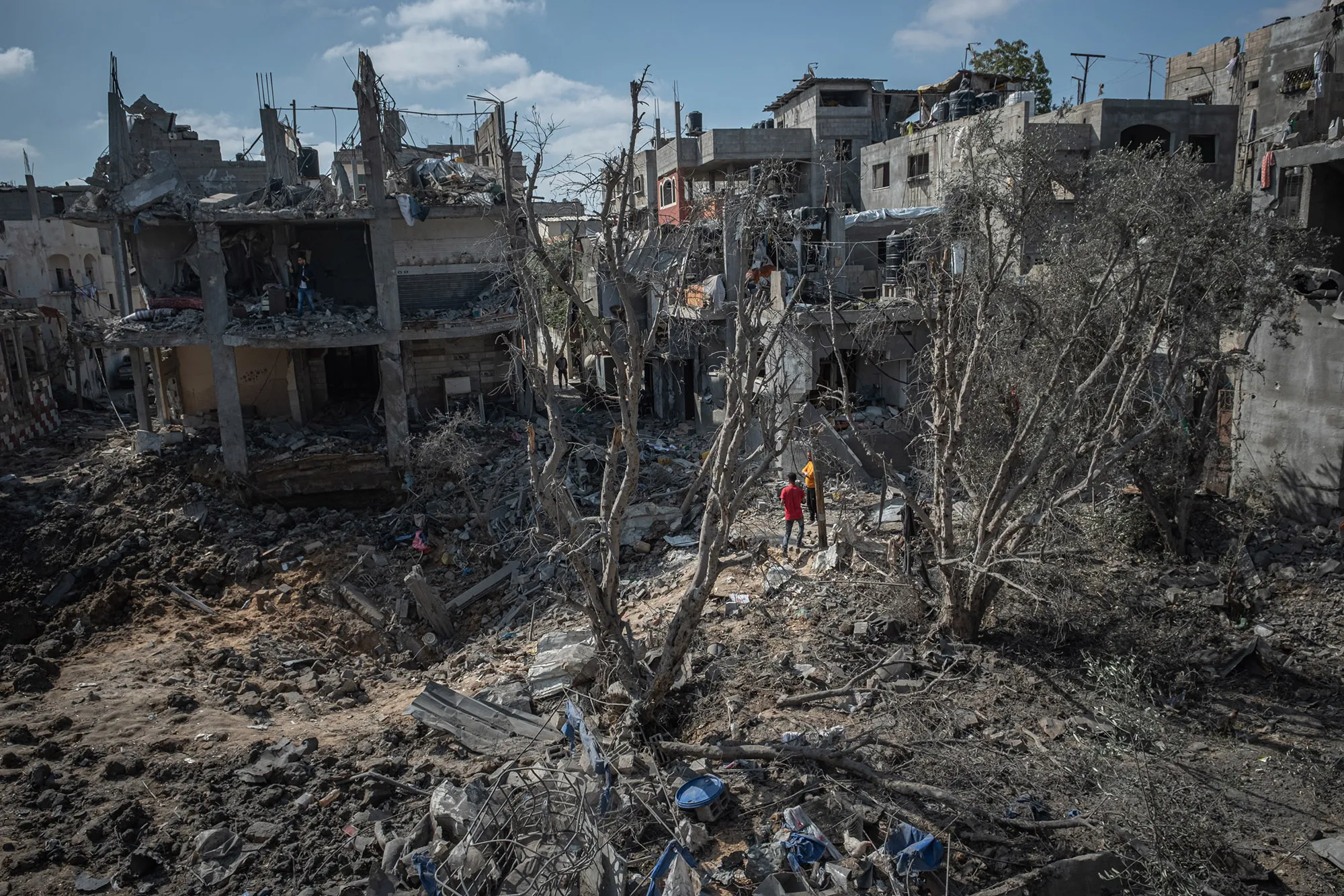 People inspect damage in&nbsp;Beit Hanoun, Gaza after a night of Israeli raids&nbsp;on May 14.&nbsp;