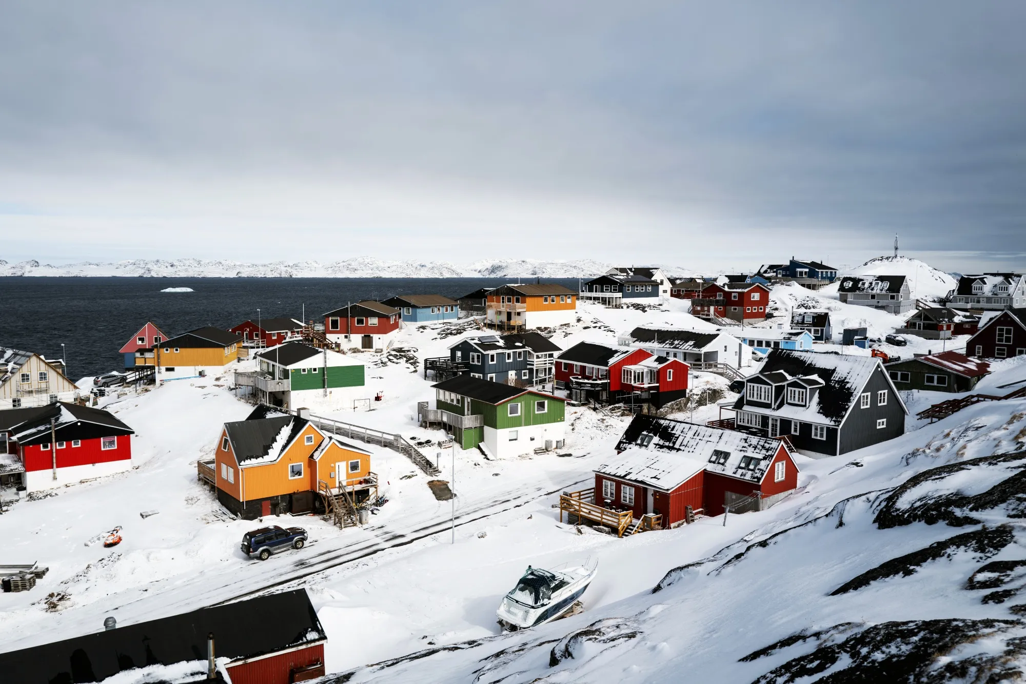 Residential buildings along the coastline in Nuuk, Greenland.