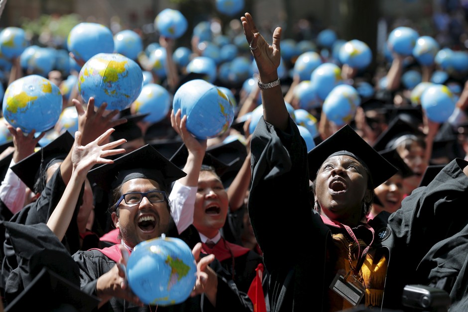 Students celebrate at the John F. Kennedy School of Government commencement at Harvard University in 2015.