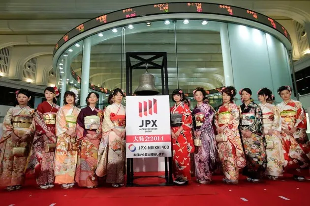 Women employees of the Tokyo Stock Exchange and its member securities companies at the opening ceremony of the JPX-Nikkei Index 400 in Tokyo on Jan. 6