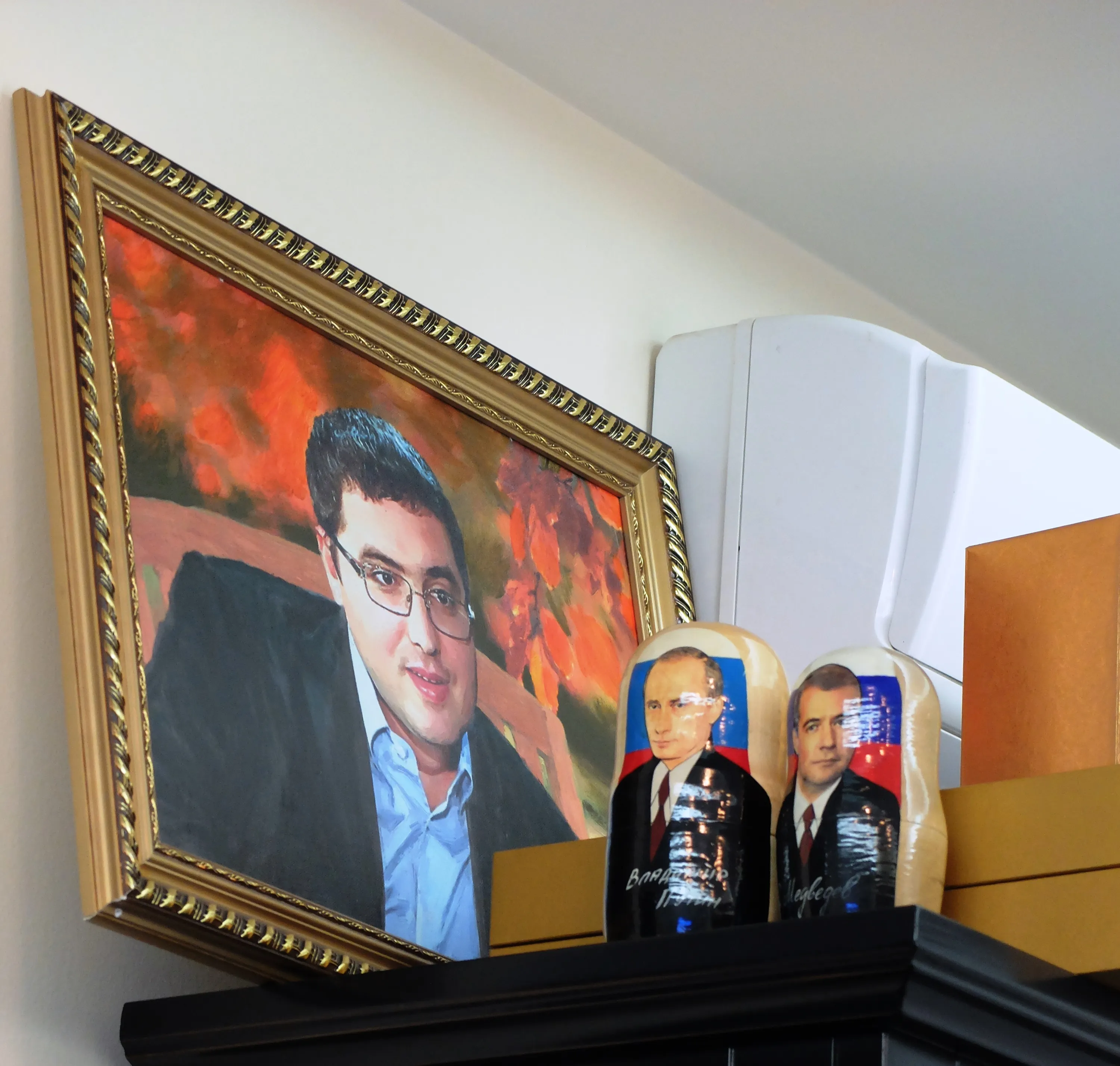 Painting of Renato Usatii at his office.

