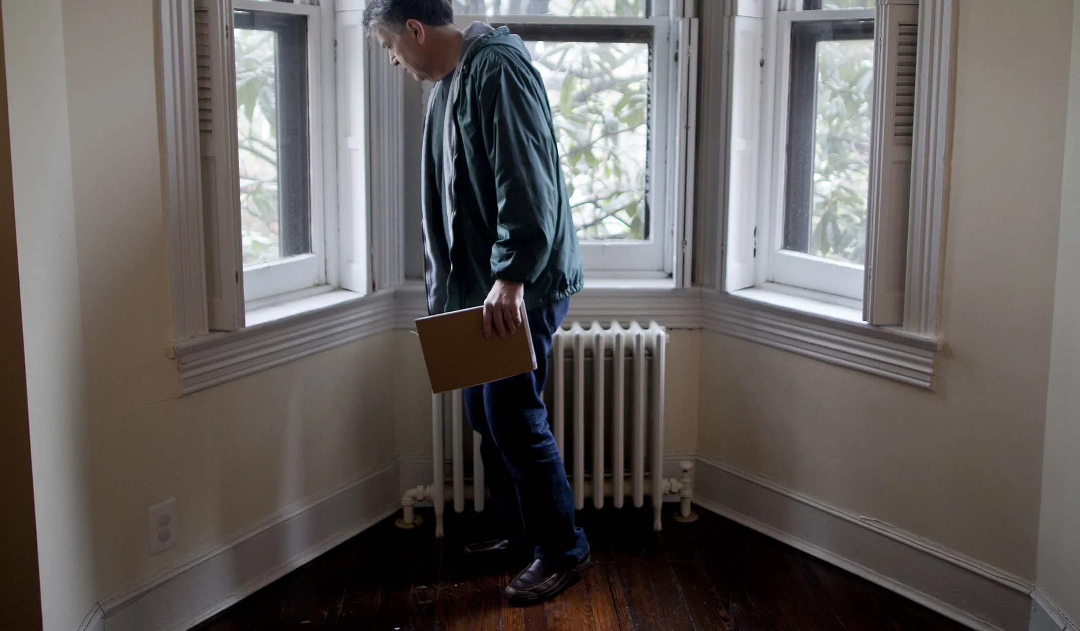 A potential homebuyer walks through a house for sale in Washington, D.C.
