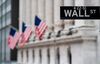 A sign reading "Wall Street" is pictured in front of New York Stock Exchange (NYSE) on January 13, 2020 in New York City. (Photo by Johannes EISELE / AFP) (Photo by JOHANNES EISELE/AFP via Getty Images)