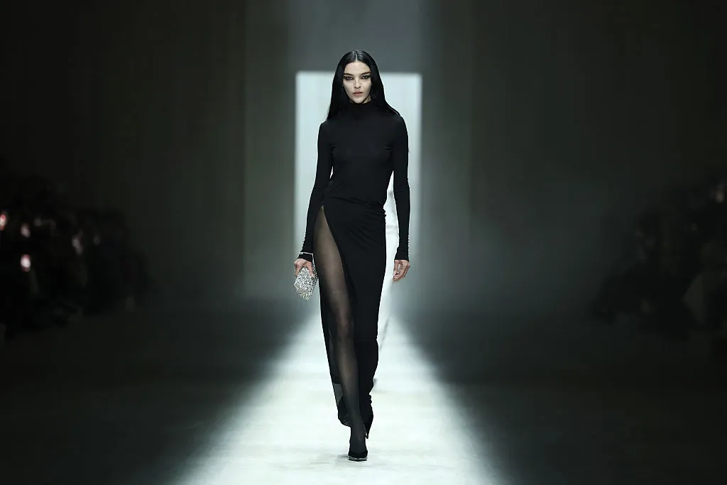 Mariacarla Boscono walks the runway during the Gucci FW26 Fashion Show at Palazzo Delle Scintille in Milan.