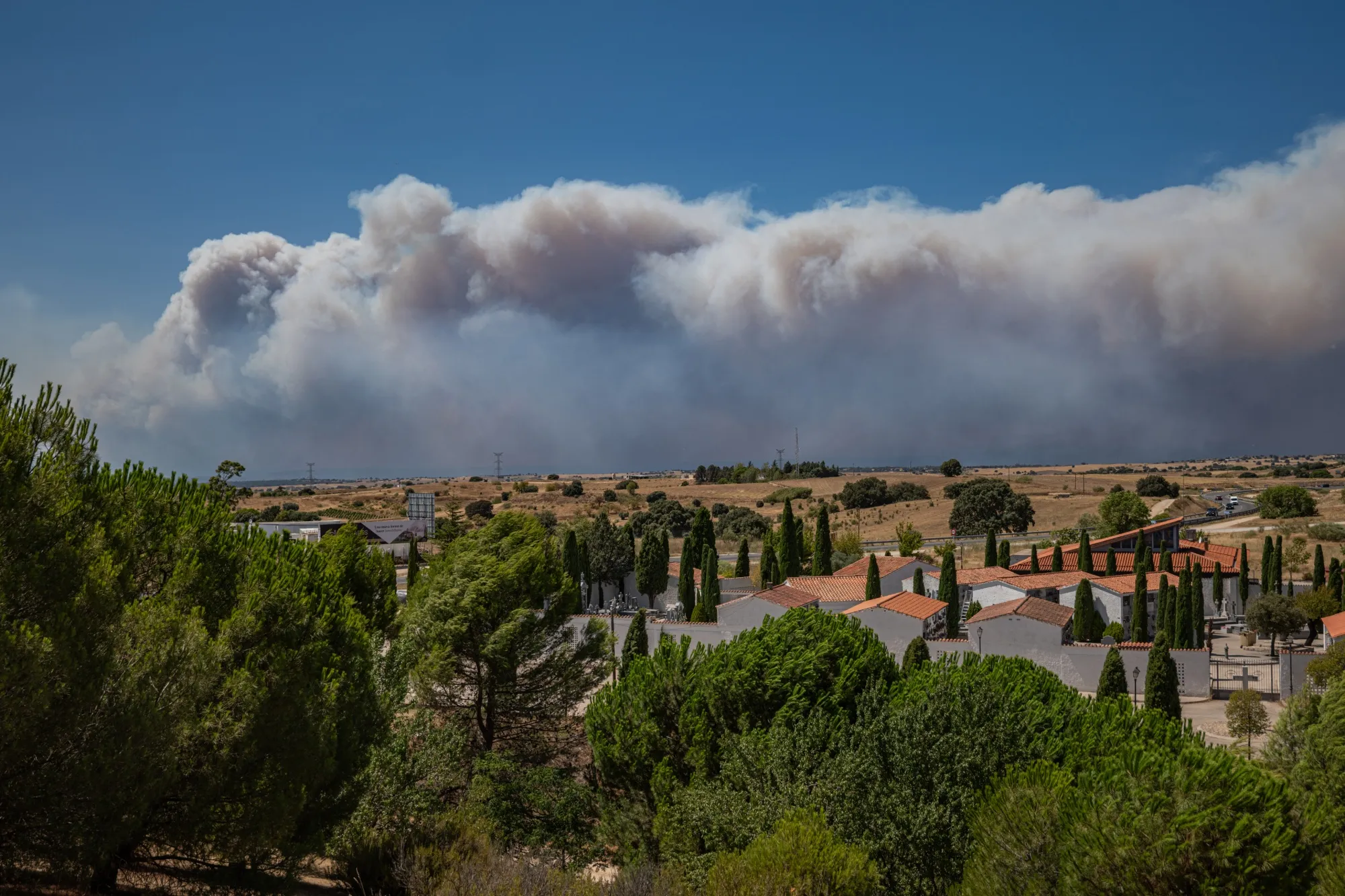 France and Spain respond to wildfires with economic support plans amid ongoing heatwaves; over 200,000 evacuated in France.