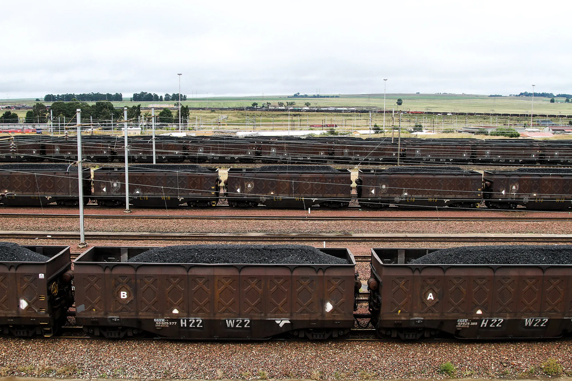 Coal sits in freight wagons ahead of transportation at a depot in Ermelo, South Africa.
