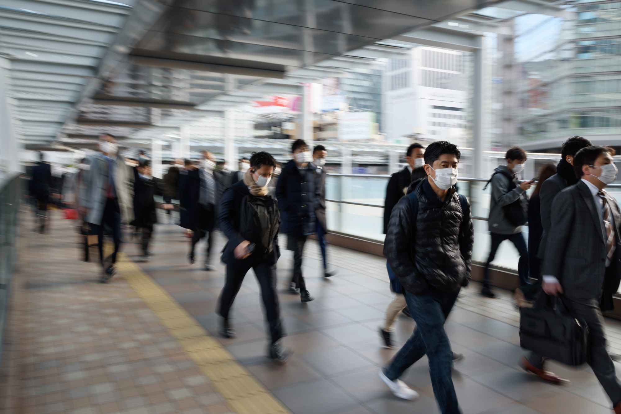 Commuters In Tokyo As Japan Encourages Employees To Work From Home