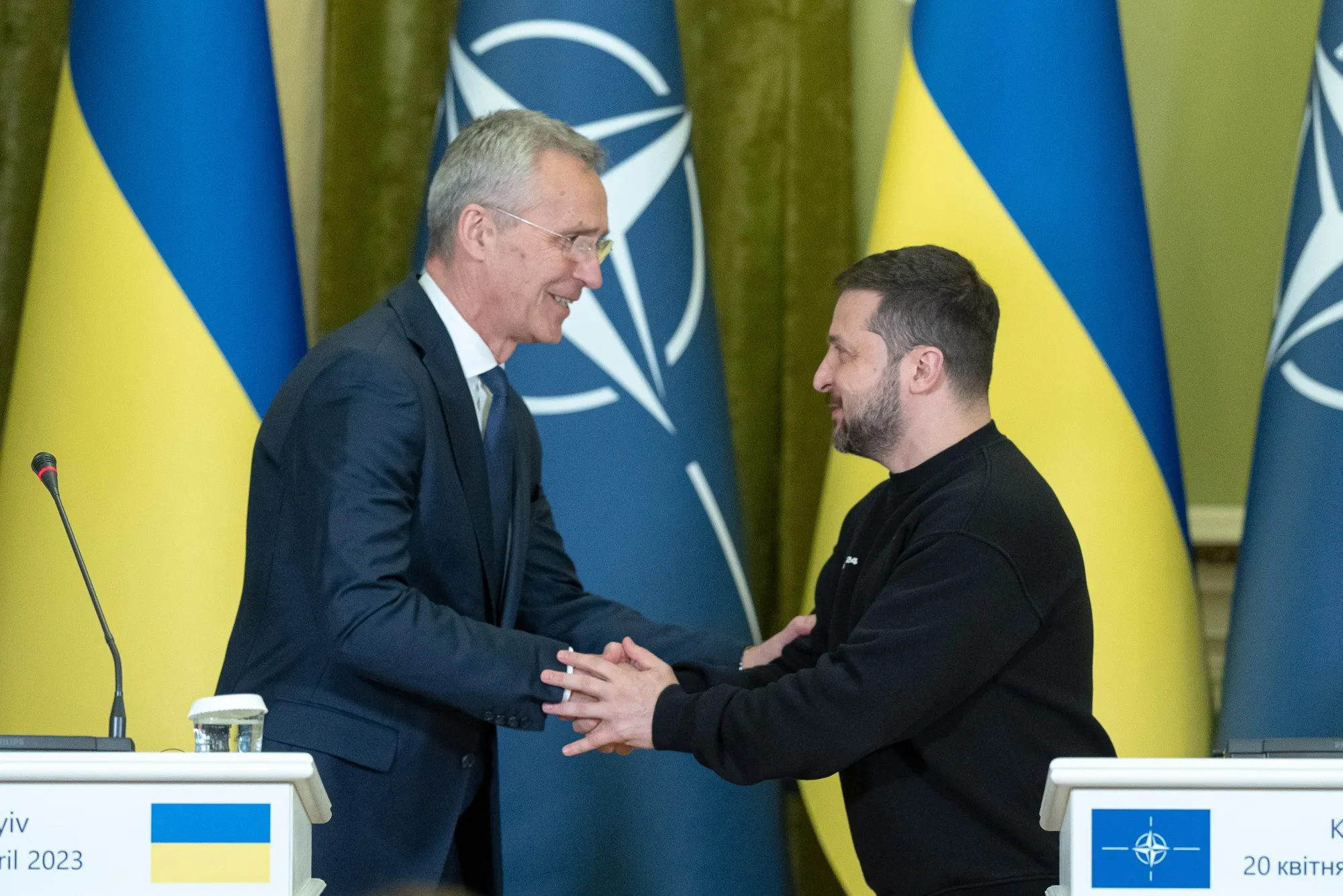 Jens Stoltenberg, left, with Volodymyr Zelenskiy in Kyiv, on April 20.
