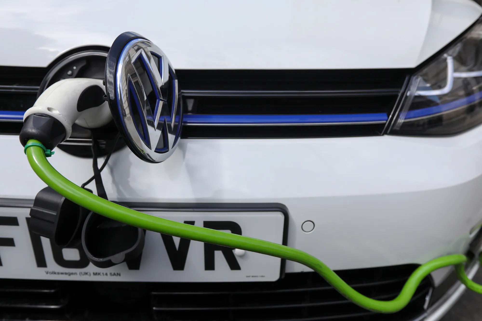 A charging plug on a Volkswagen AG GTE Golf hybrid automobile.&nbsp;