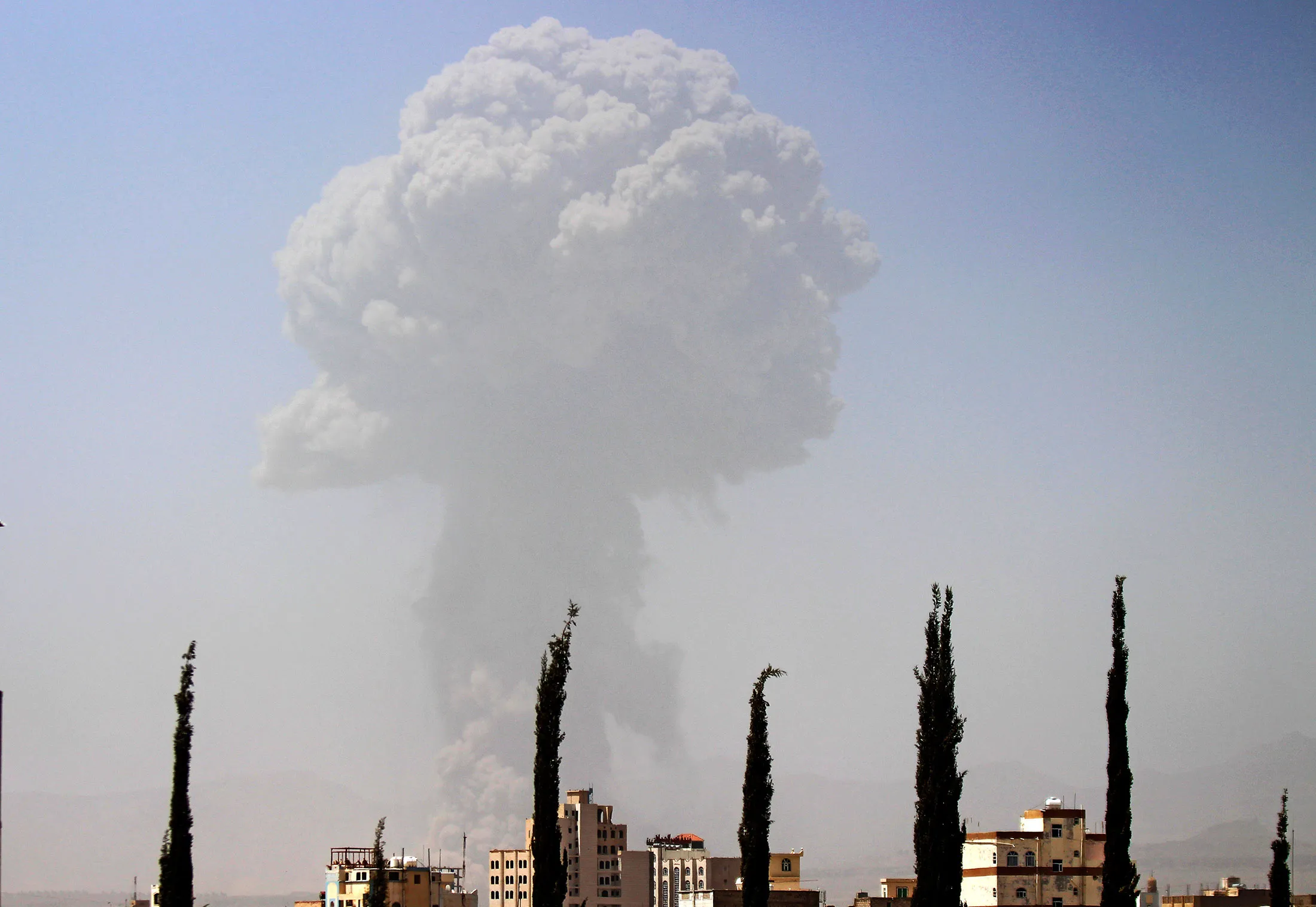 Smoke rises after a Saudi-led airstrike hit a site where many believe the largest weapons cache in Yemen's capital, Sanaa, is located on Monday, April 20, 2015.
