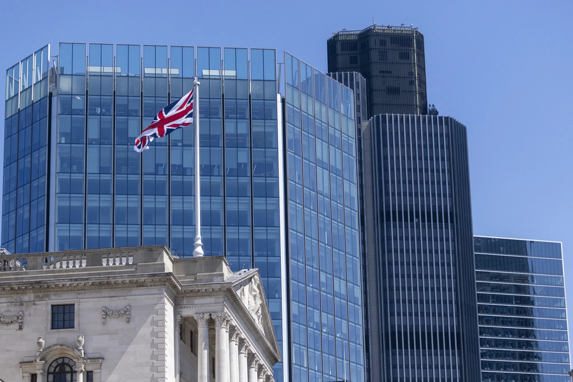The Bank of England, left, in the City of London.