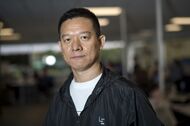 Jia "YT" Yueting, chief executive officer of LeEco Global Group, stands for a photograph at the company's headquarters in San Jose, California, U.S., on Thursday, Oct. 13, 2016. LeEco is bringing its version of the seamless entertainment experience to the U.S., unveiling its TVs, smartphones, and VR goggles that will soon be available to Americans. Photographer: David Paul Morris/Bloomberg