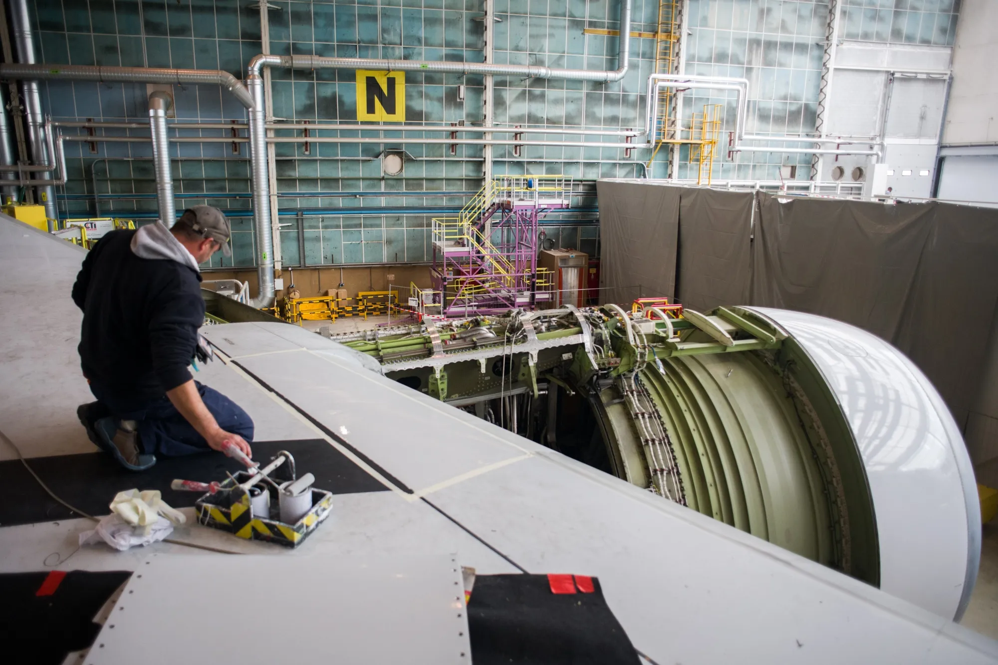 A strike by aircraft machinists held down industrial production by an estimated 0.3%.