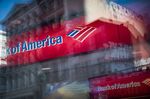 Bank of America Corp. signage is seen with street reflections on a window in New York, U.S., on Wednesday, Oct. 12, 2016.
