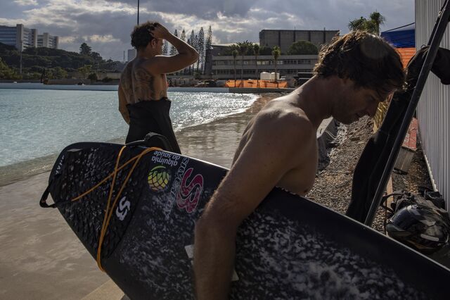 Surfers at Beyond The Club near the surf pool. 