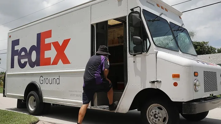 Watch FedEx to Merge Delivery Networks in Cost-Cutting Move - Bloomberg