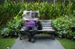 A man reads a newspaper with an image of former prime minister Lee Kuan Yew in Singapore in March 2015.
