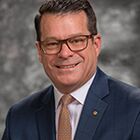 Headshot of Kevin P Riley