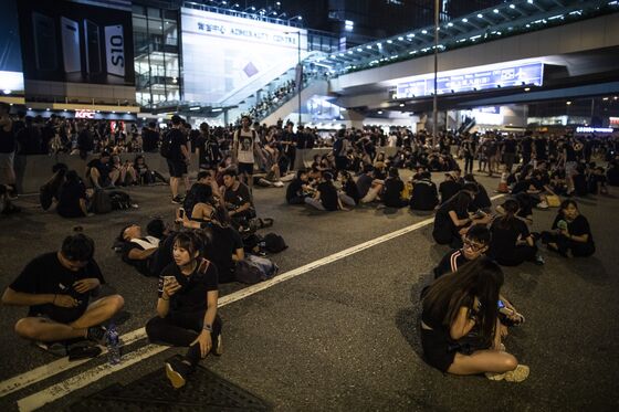 Hong Kong Stocks Advance as Protests Force Climbdown on Bill