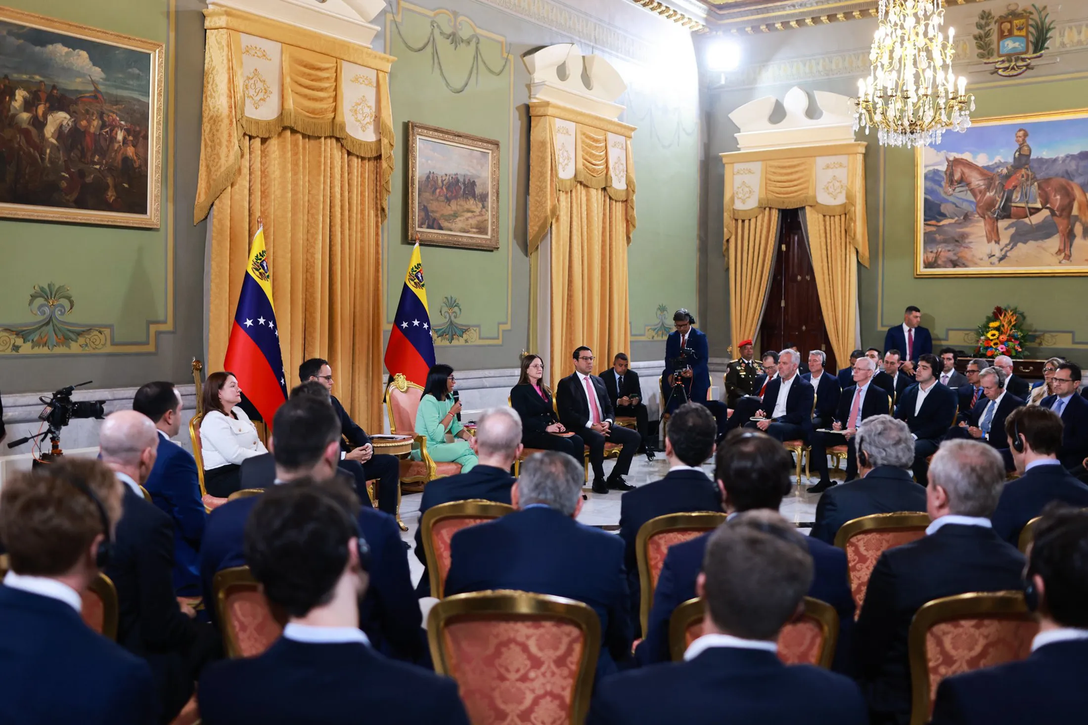 Rodriguez meets with national and foreign investors at Miraflores Palace in Caracas, in this handout photo released by Venezuela’s Ministry of Communications and Information on March 24.