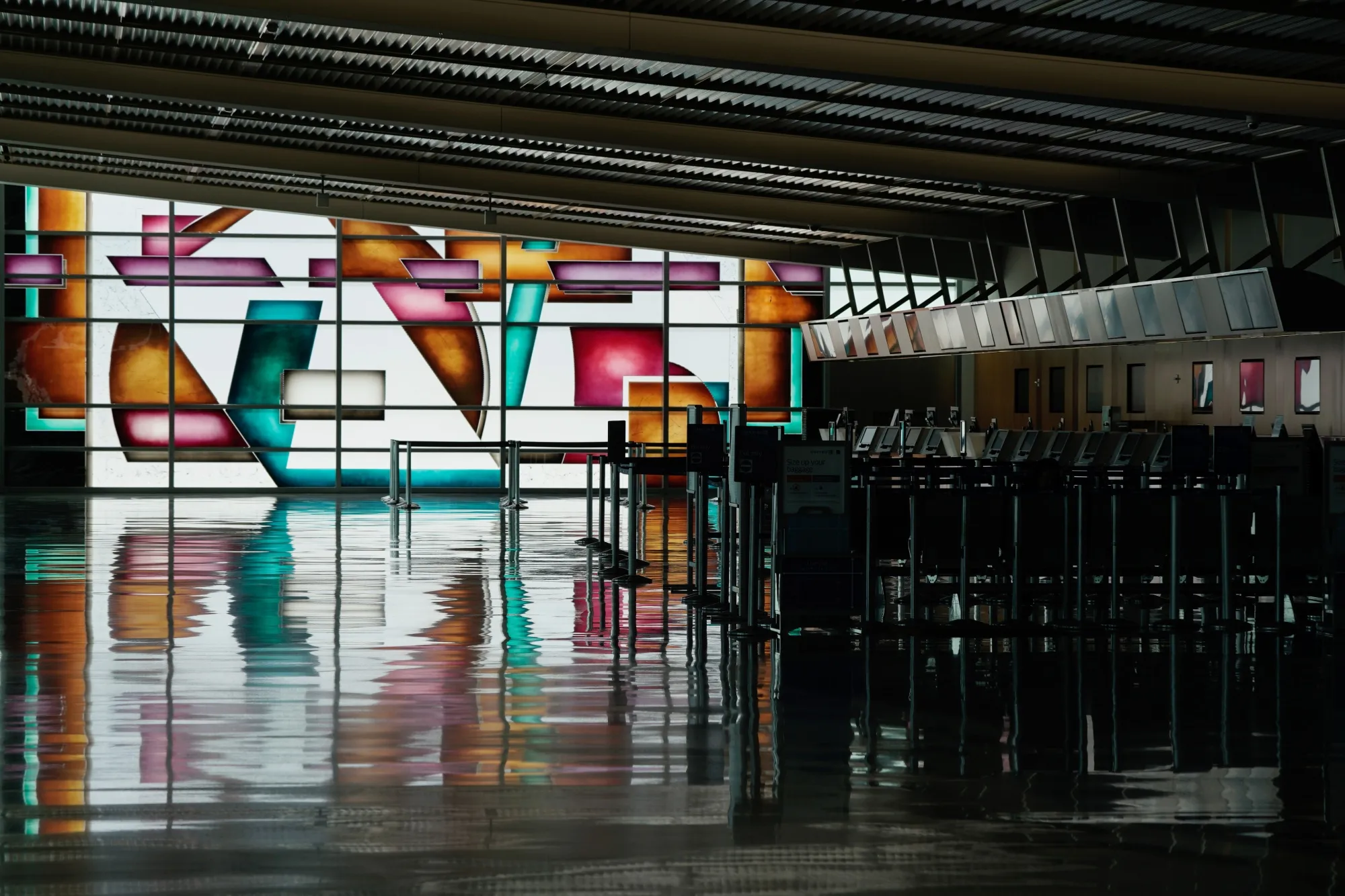 "Sunlight Juxtaposed", a glass artwork by Joan Irving, is seen in the ticketing area of Terminal 2 at San Diego International Airport on April 27.