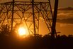 An Electricity Pylon At Sunset