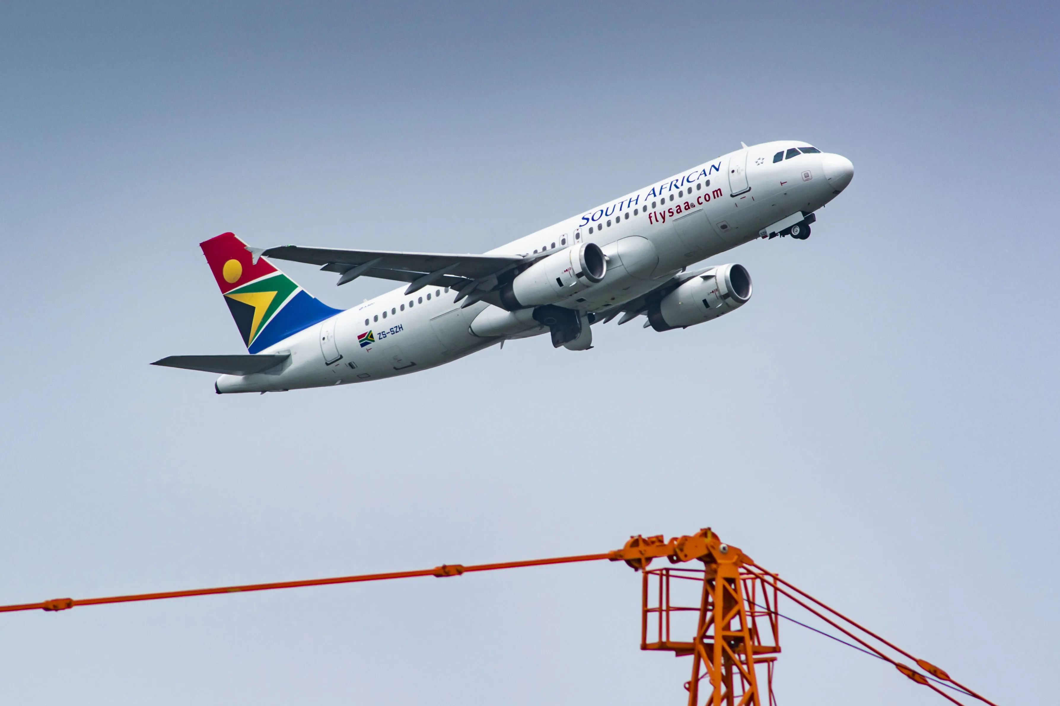 An Airbus A320-200 passenger jet, operated by South African Airlines takes off from O.R. Tambo International Airport in Johannesburg.