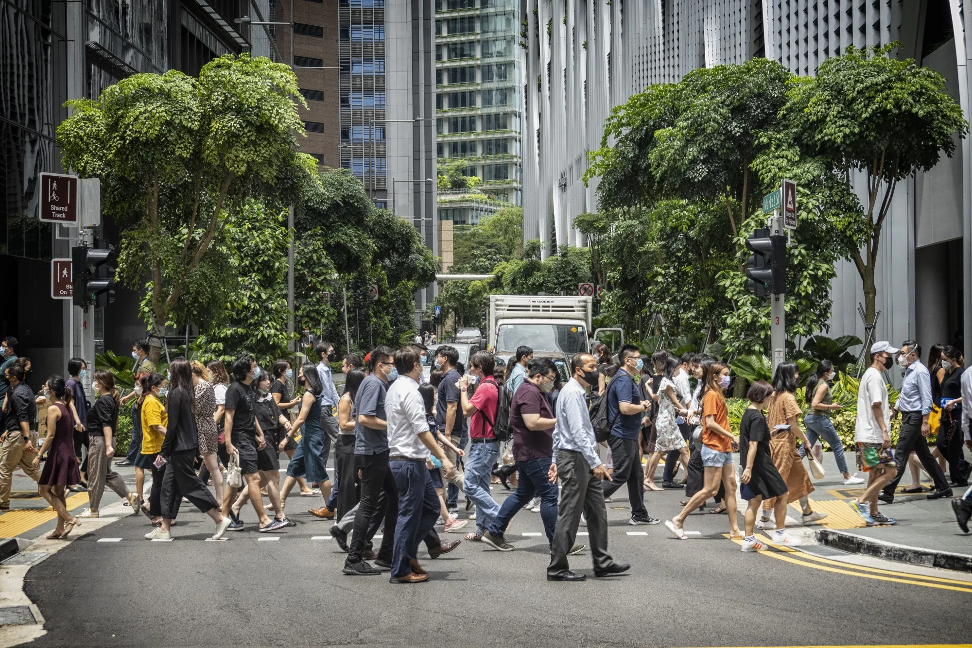 Pedestrians in the central business district in Singapore.