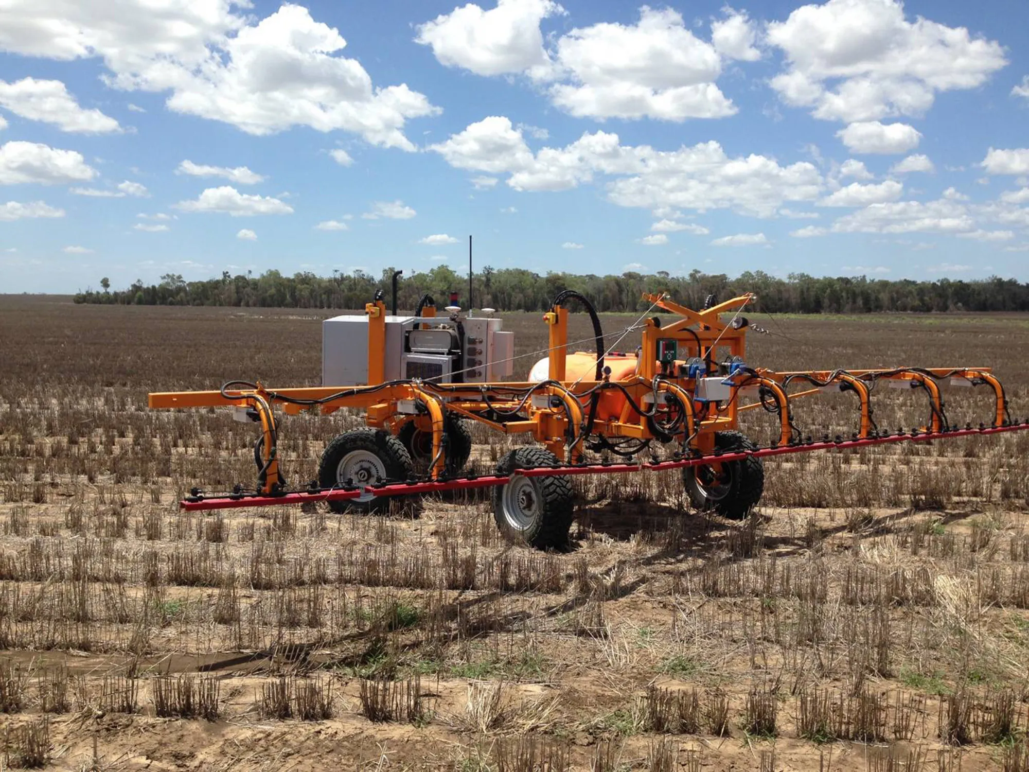 SwamFarm robot spraying on a farm in Australia.