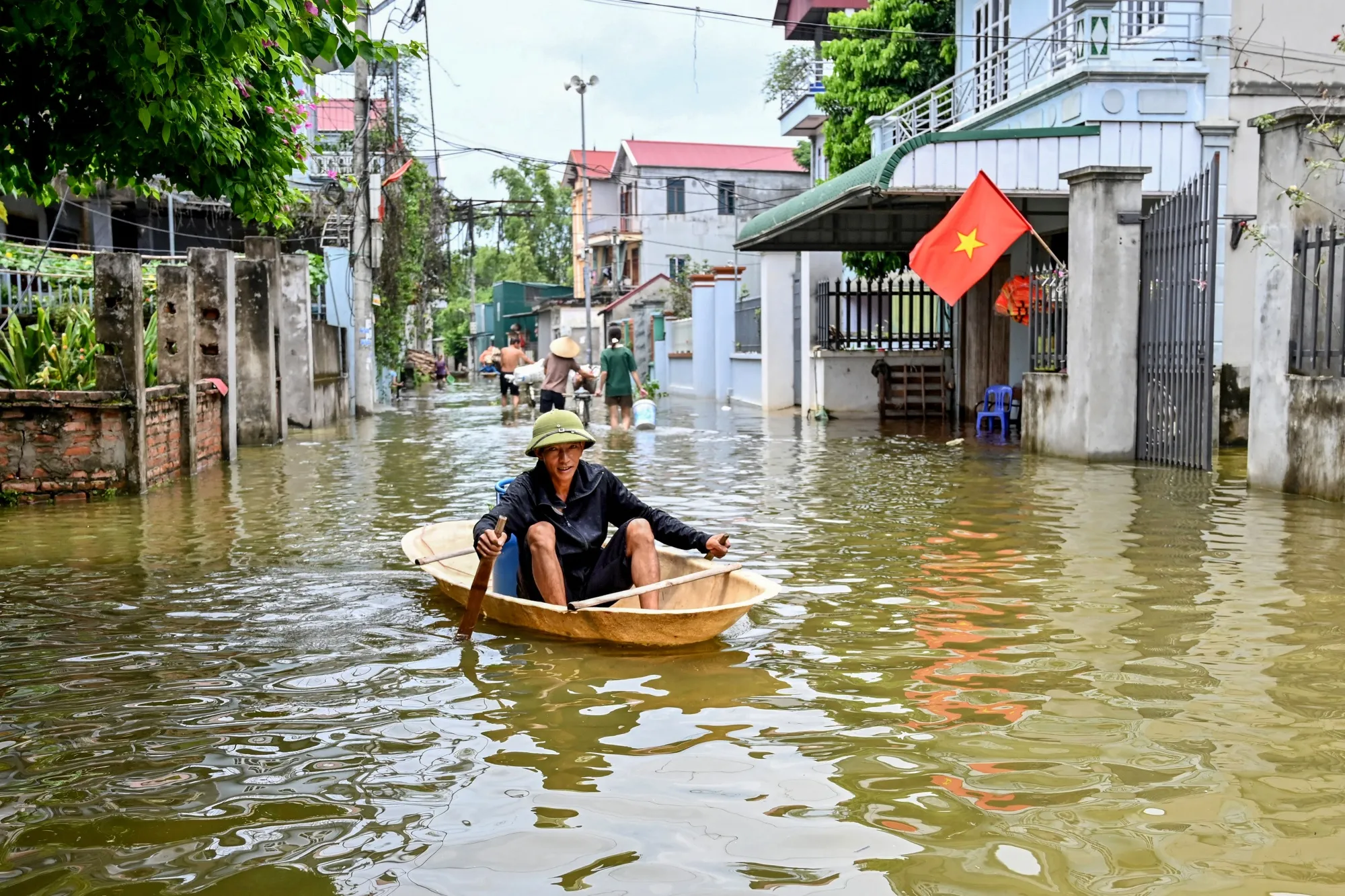 Floodwaters in a village on the outskirts of Hanoi, on July 28.