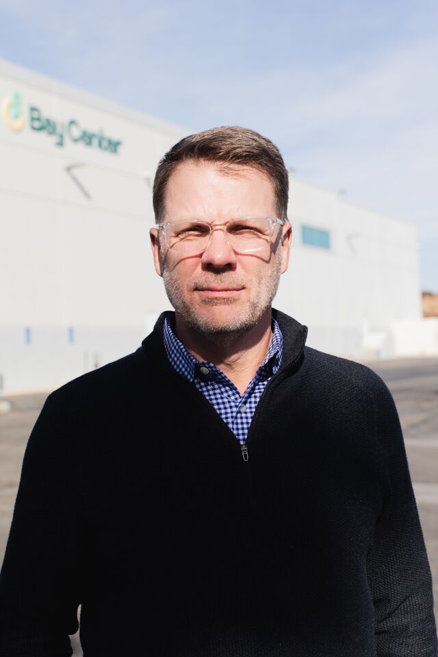 A portrait of Mike Hazelton outside the facility. 