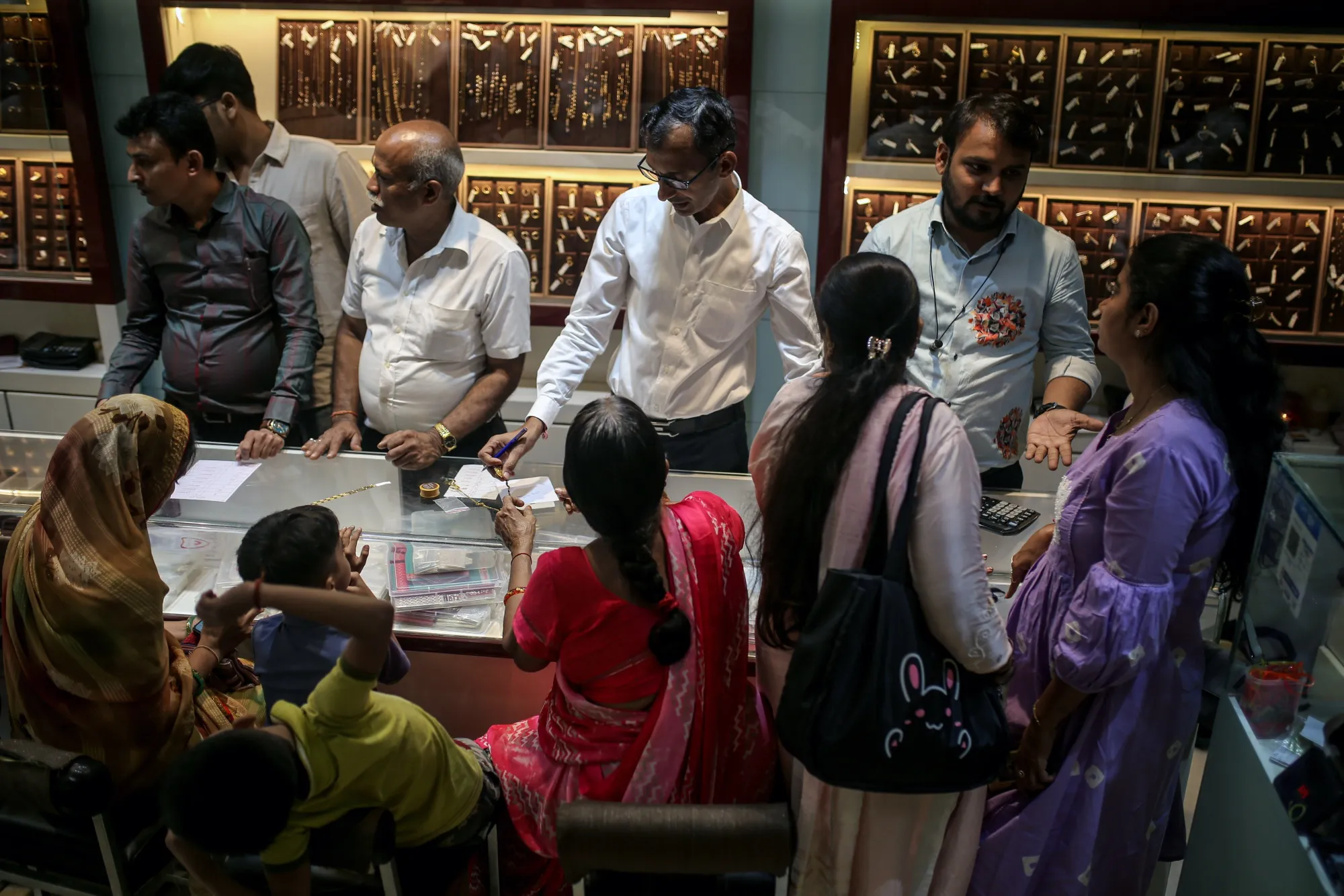 Customers inside a jewelry store in Mumbai.