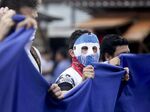 A masked demonstrator attends a protest&nbsp;in Managua, Nicaragua, on&nbsp;Aug. 2, 2018.&nbsp;