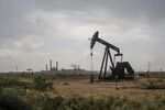 A pump jack extracts oil in Yoakum County, Texas.