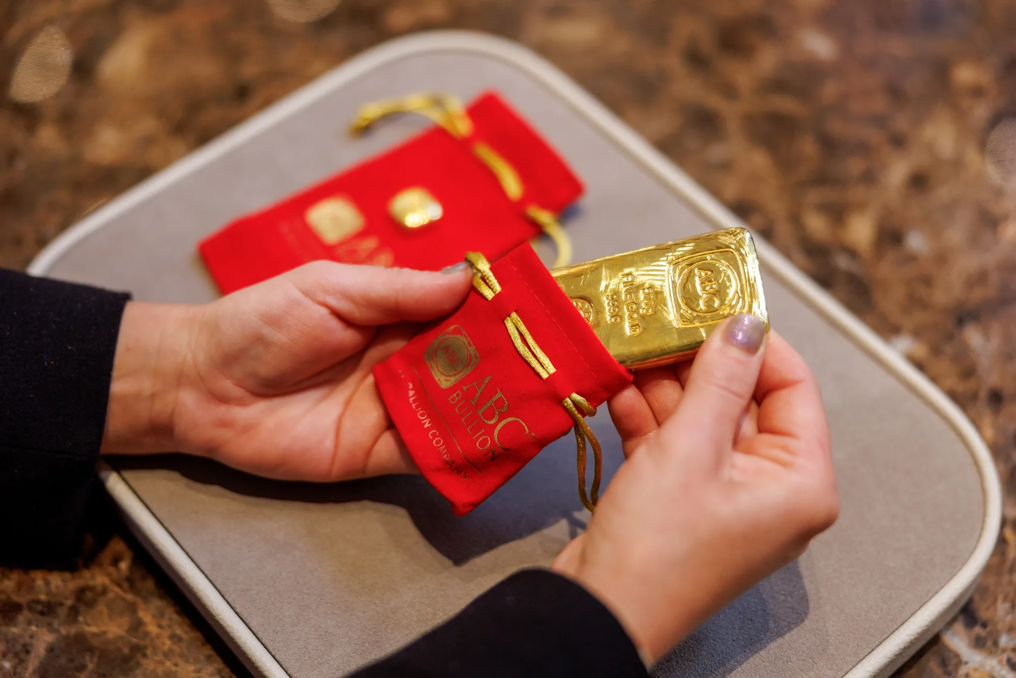 A 500 gram gold bar in a protective pouch at an ABC Bullion store in Sydney, Australia.