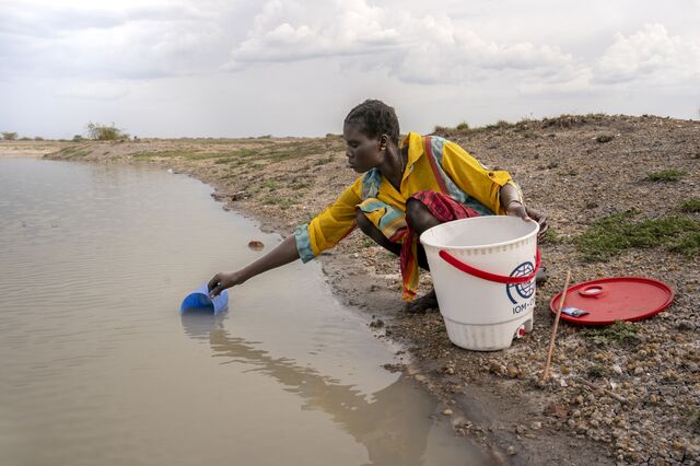 Sarah Nyaluak collects water from a pond near her home in Rier, the nearest village to the oil wells. She treats the water with a basic purification method. Each year, she says, runoff water stored in large pits about two miles away overflows during the rainy season. In April 2021, Nyaluak gave birth to a baby girl with a small heart and severe breathing difficulties; the child died three months later.