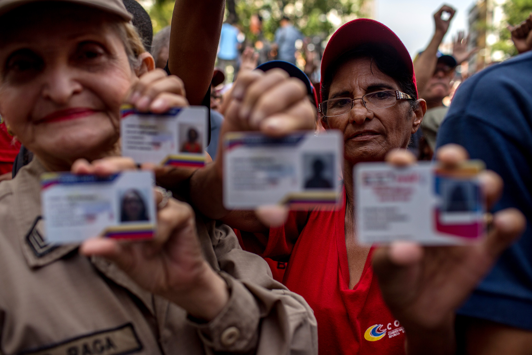People display their Card of the Fatherland