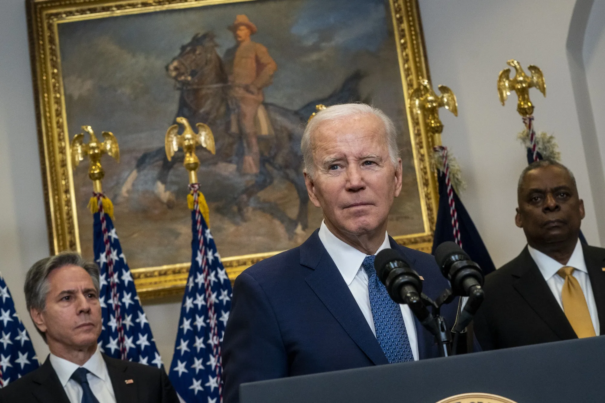 US President Joe Biden speaks in the Roosevelt Room of the White House with Antony Blinken, US secretary of state, and Lloyd Austin, US secretary of defense.