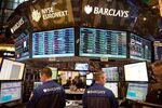 Traders at the Barclays booth on the floor of the New York Stock Exchange on Jan. 2, 2013