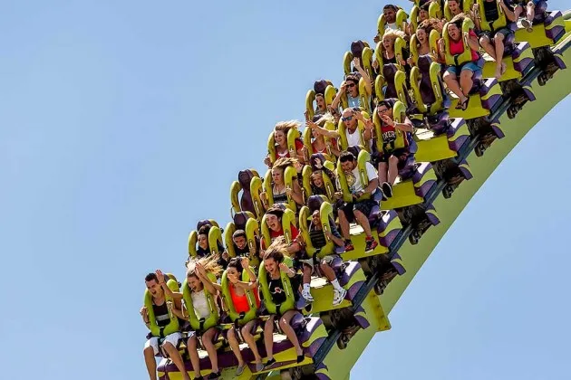 Visitors ride the Medusa roller coaster at Six Flags Discovery Kingdom amusement park in Vallejo, Calif.