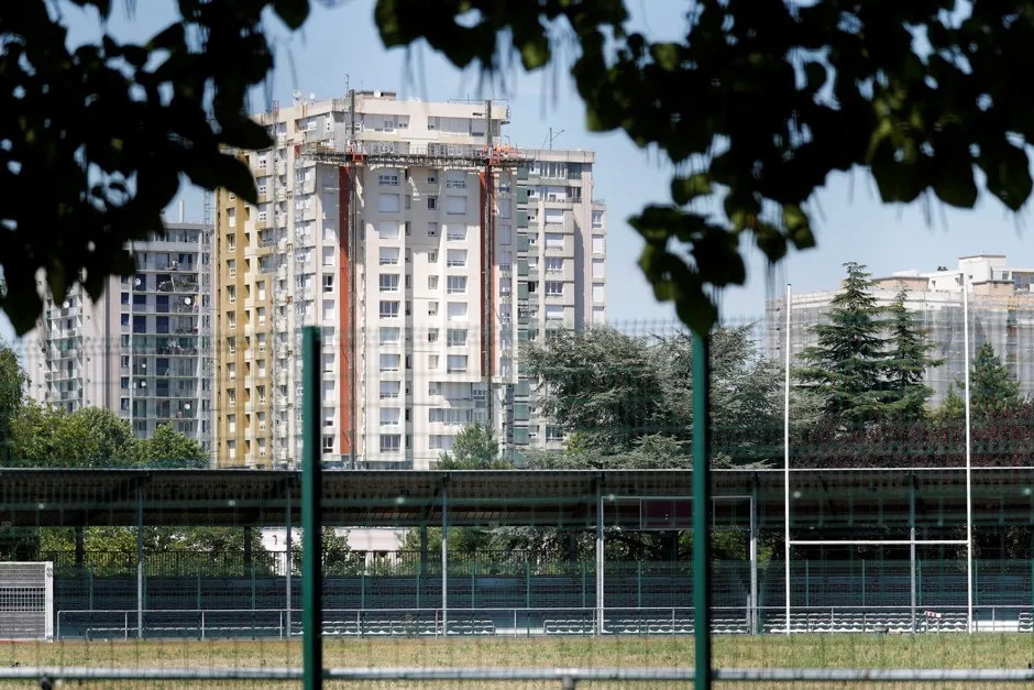 The Marville stadium, part of the Marville sports complex, is seen in front of estate housing blocks in Saint-Denis, near Paris, France, July 21, 2017. The complex will undergo renovation for water polo competitions as Paris prepares to host the 2024 Olympic Games. 