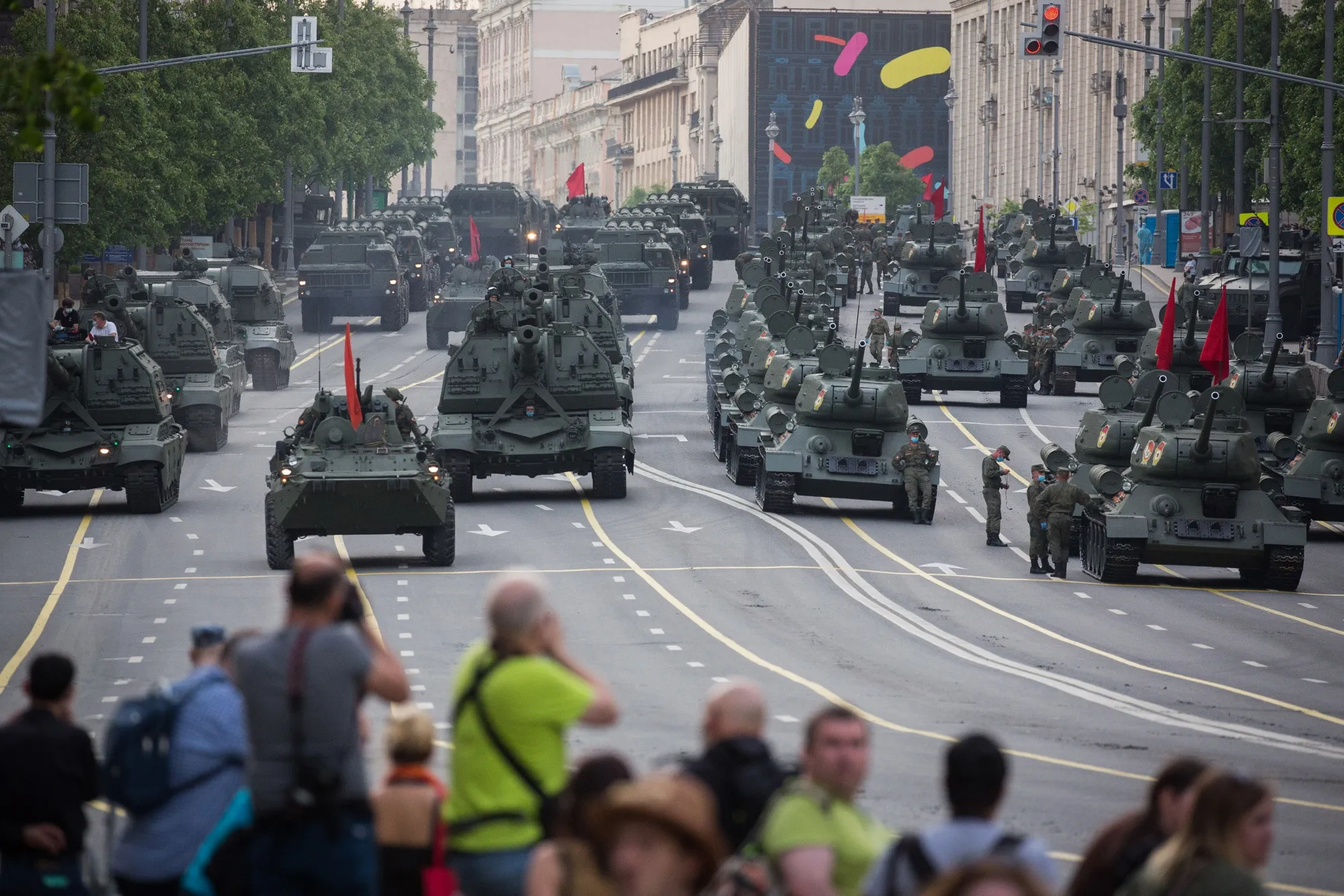 Crowds watch military vehicles and tanks during a Victory Day rehearsal in Moscow in 2020.