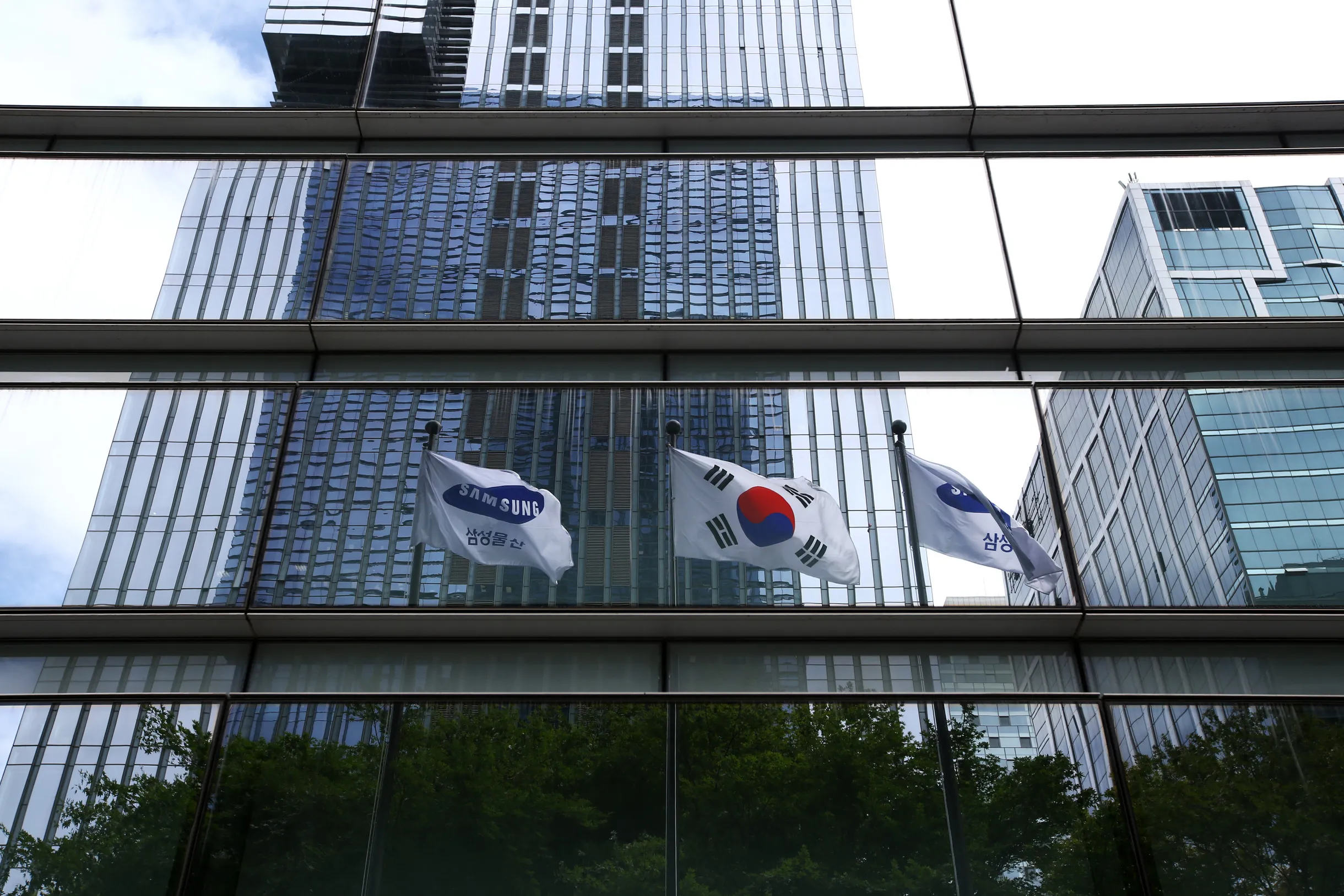 Samsung C&amp;T Corp. Co-Chief Executive Officers Arrive For Shareholders' Meeting As Vote Pits Paul Elliott Singer Against Samsung Group
