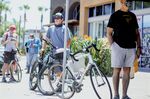 Customers outside the Trek Bicycle Shop in San Diego, May 15, 2020.