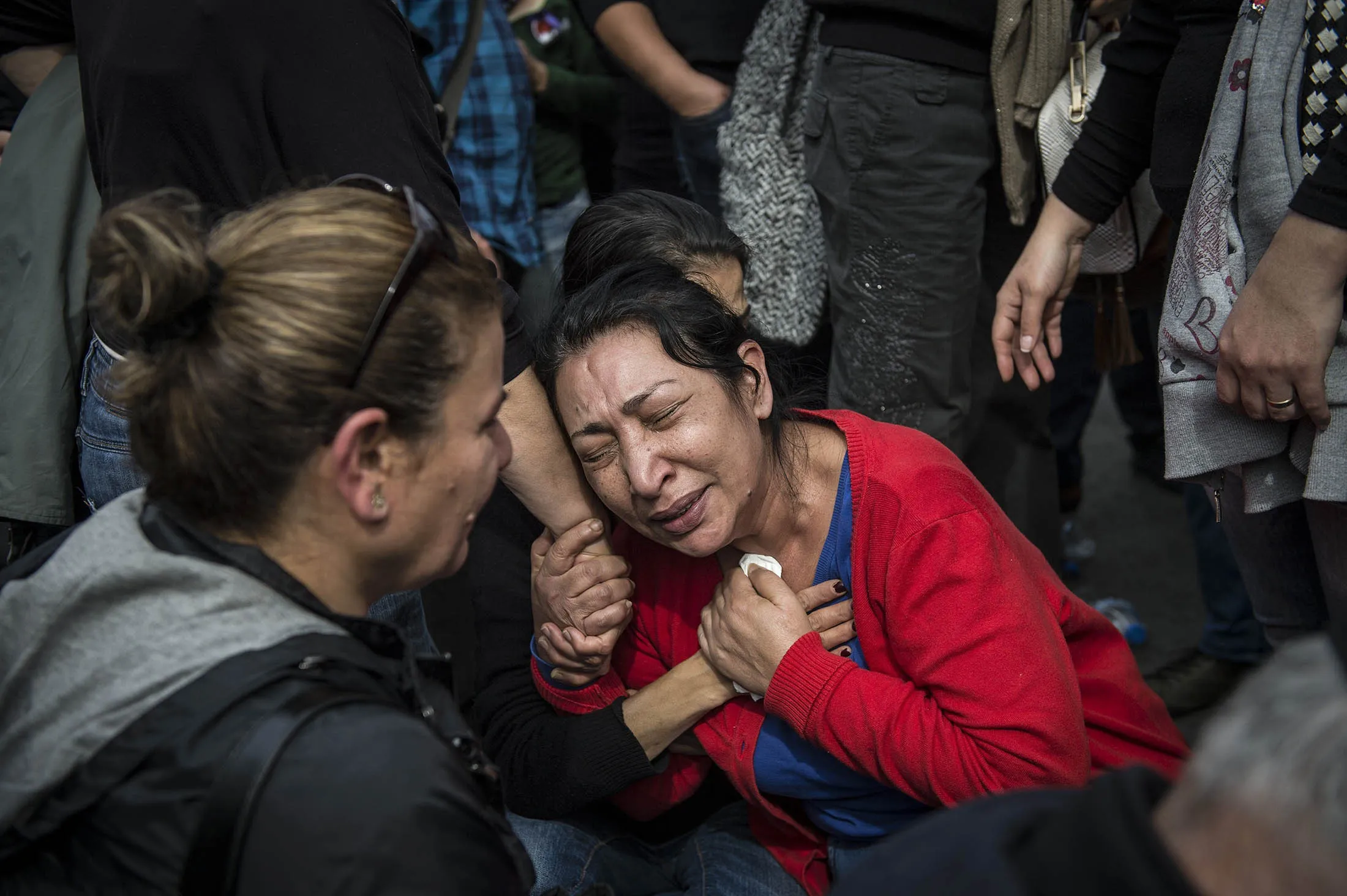 A woman cries at the scene of yesterday's attack outside main train station in Ankara, Turkey on Oct. 11.
