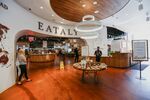 The high-end food chain Eataly, seen here inside the Westfield mall in New York’s World Trade Center complex, is one of many grocery chains that may help American malls survive.