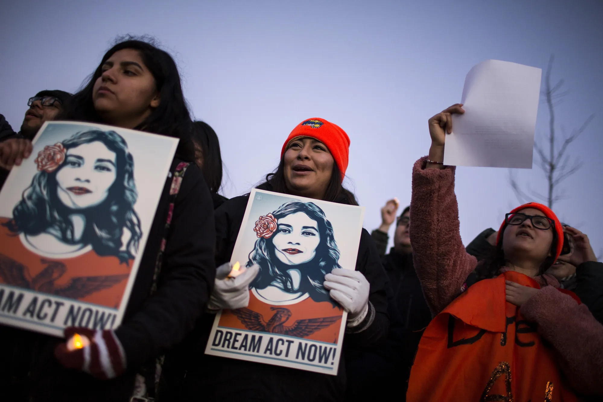 Demonstrators hold signs during a rally supporting the DACA program, or the Dream Act, outside the U.S. Capitol building in Washington, D.C. in 2018.