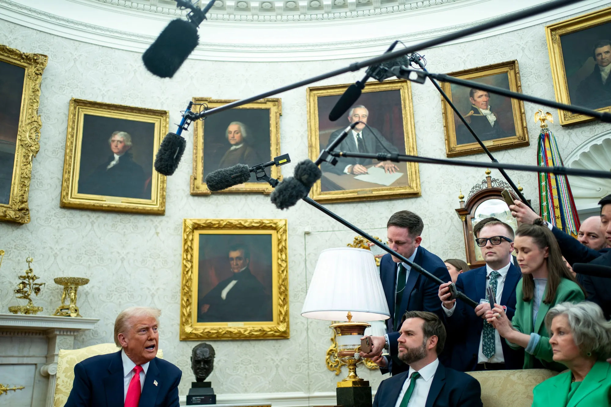 Donald Trump and JD Vance during meetings in the Oval Office.